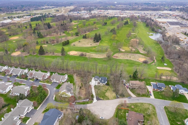 drone / aerial view featuring a residential view and view of golf course