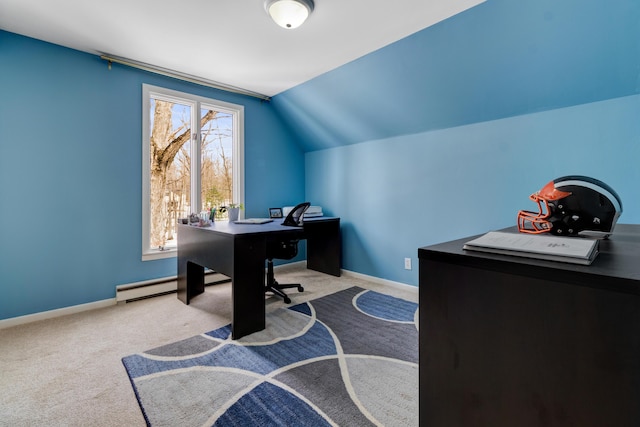 carpeted office space featuring a baseboard heating unit, lofted ceiling, and baseboards