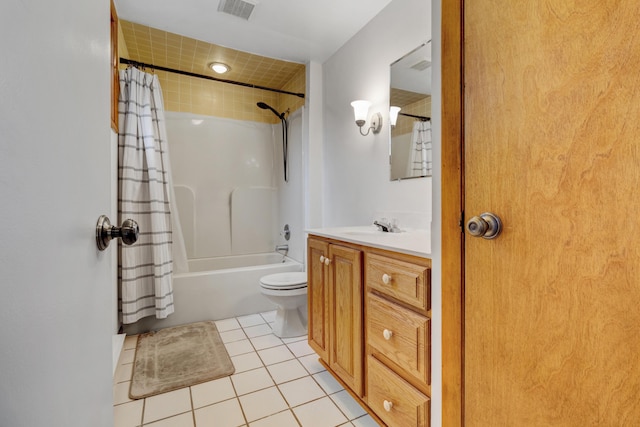 bathroom featuring tile patterned flooring, toilet, vanity, visible vents, and shower / bath combination with curtain