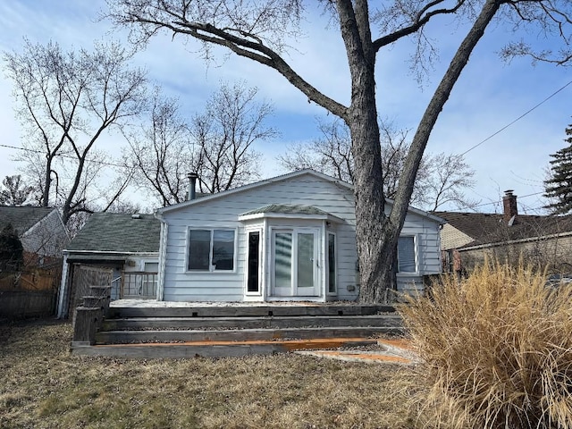 view of front of house with a wooden deck