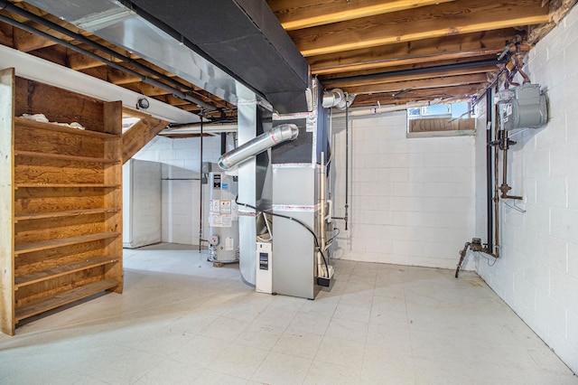 basement featuring heating unit, gas water heater, and tile patterned floors