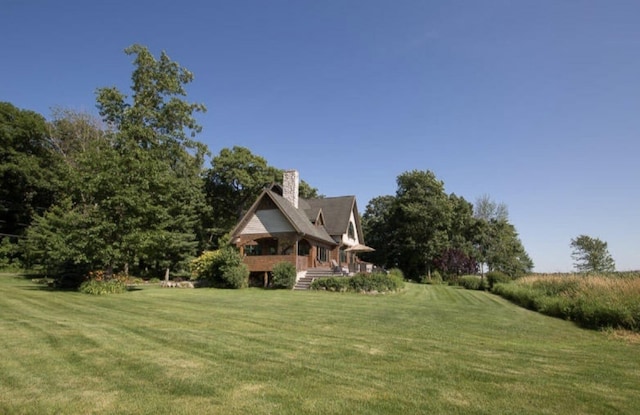 view of yard with a wooden deck