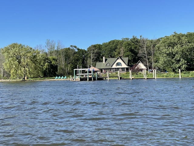 view of water feature with a wooded view