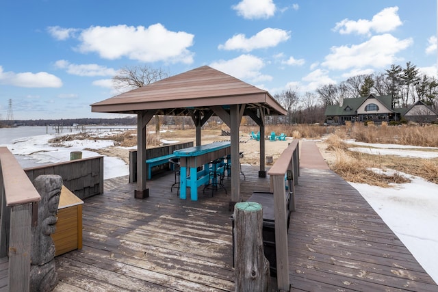 view of dock featuring a deck and a gazebo