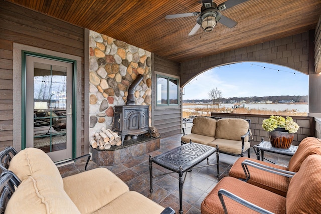 view of patio / terrace with an outdoor hangout area and a ceiling fan