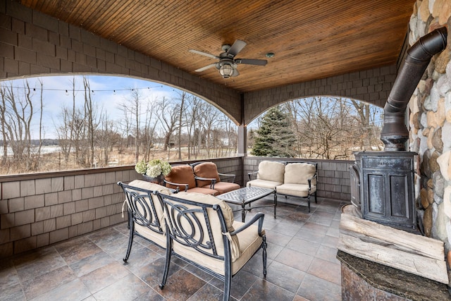 view of patio / terrace with outdoor lounge area and a ceiling fan