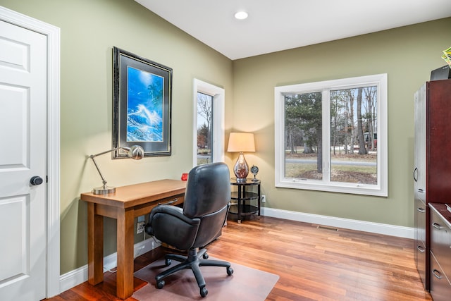 office area with recessed lighting, wood finished floors, visible vents, and baseboards