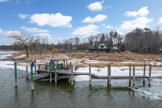 view of dock featuring a water view and boat lift