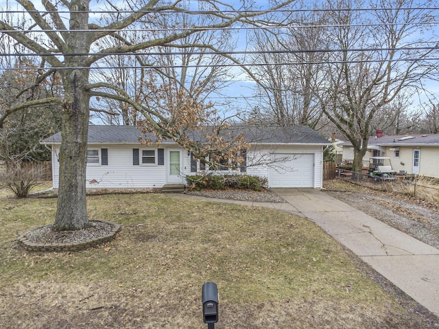 ranch-style home featuring a garage, driveway, a front lawn, and fence