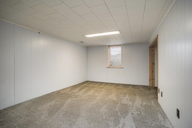 below grade area featuring carpet floors