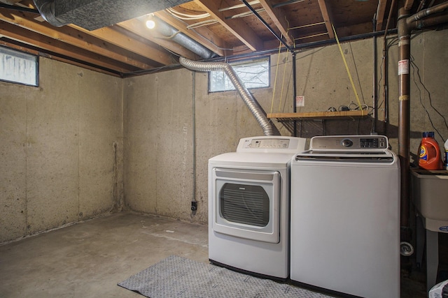 laundry room featuring laundry area and washing machine and clothes dryer