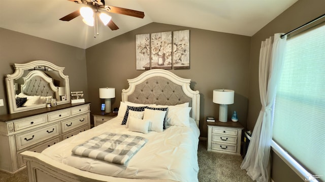 carpeted bedroom with lofted ceiling and ceiling fan