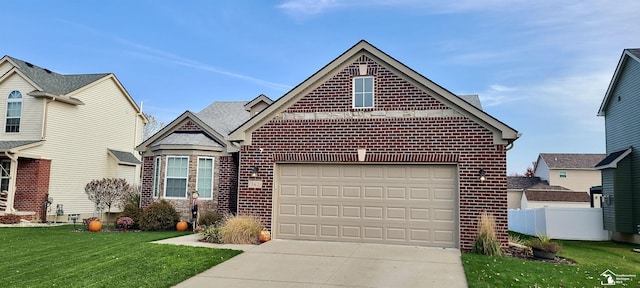 view of front facade featuring concrete driveway, an attached garage, fence, a front lawn, and brick siding