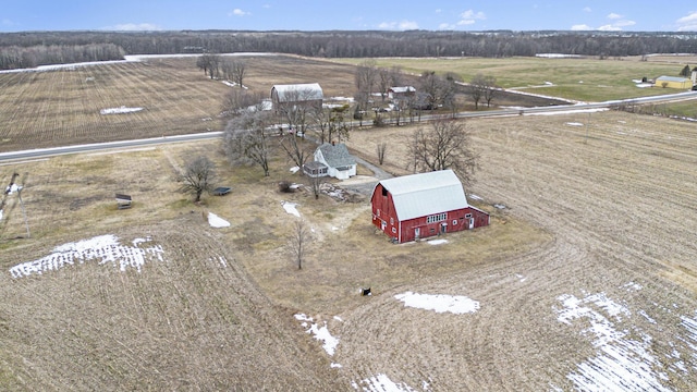 birds eye view of property with a rural view