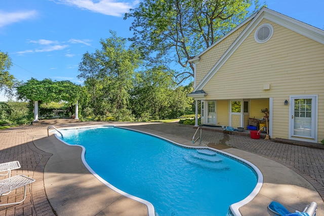 pool featuring a patio area