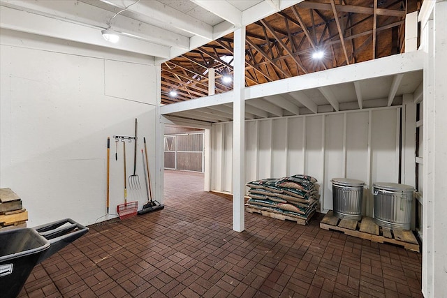 basement with brick floor
