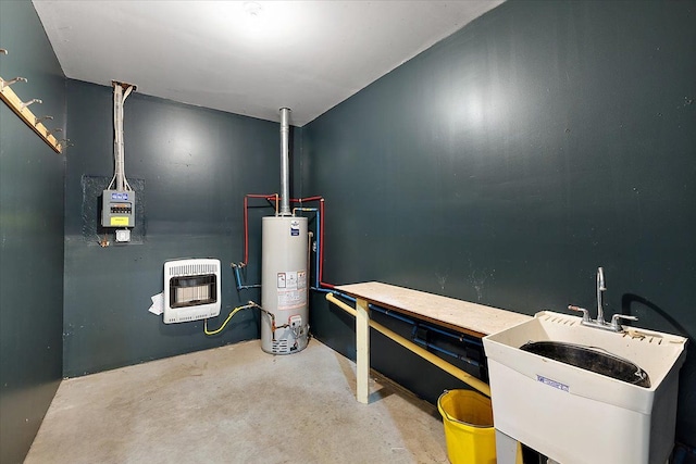 utility room featuring gas water heater, a sink, and heating unit