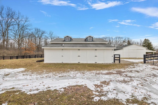 garage featuring fence