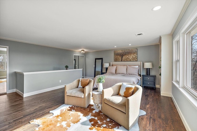 bedroom featuring crown molding, recessed lighting, baseboards, and wood finished floors