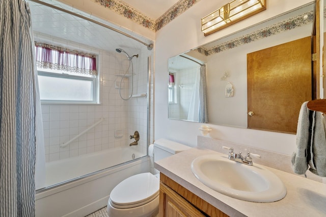 bathroom with shower / bath combo, vanity, and toilet