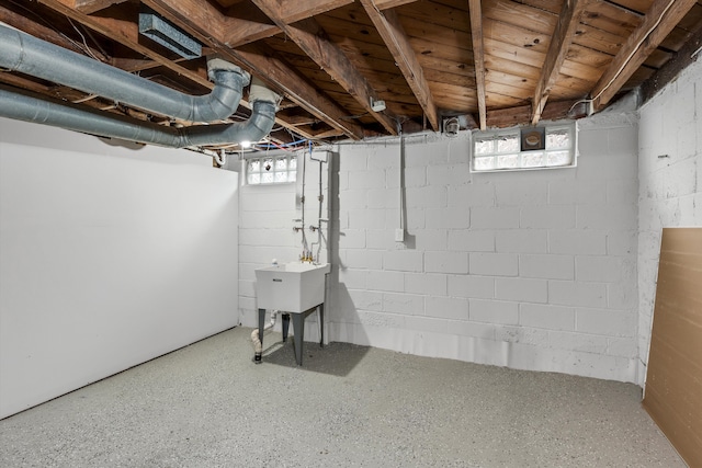 basement with a sink