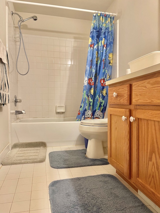 bathroom with tile patterned flooring, shower / bathtub combination with curtain, toilet, and vanity