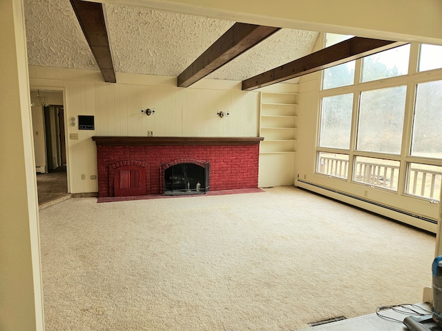 unfurnished living room with carpet floors, beam ceiling, a fireplace, a baseboard heating unit, and a textured ceiling