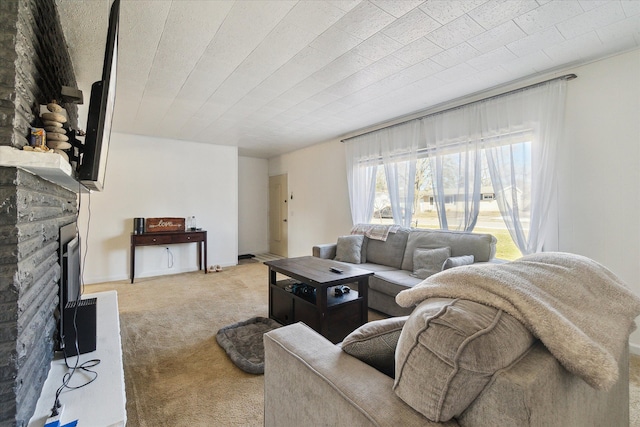 living area with carpet floors and a fireplace with raised hearth