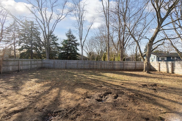 view of yard featuring a fenced backyard