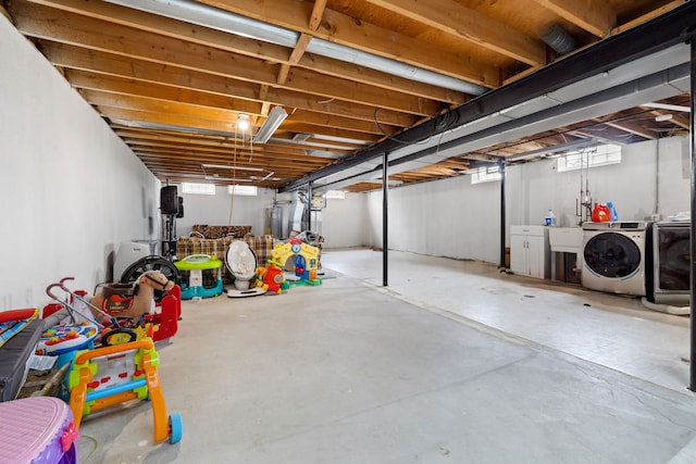 basement featuring washer and dryer