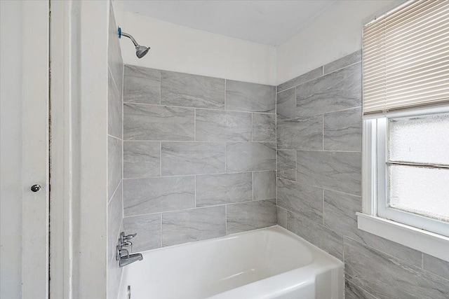 bathroom with shower / bathing tub combination