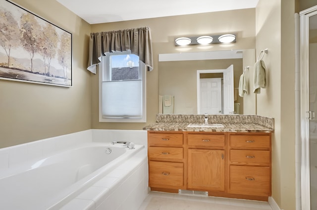 bathroom featuring visible vents, an enclosed shower, vanity, and a bath