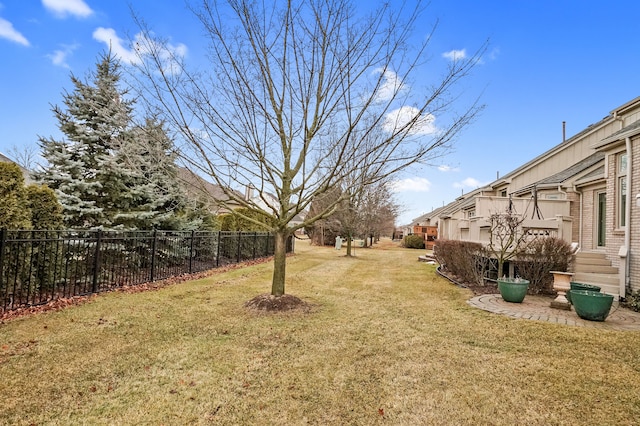 view of yard with fence