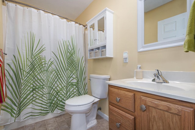 full bathroom featuring baseboards, toilet, curtained shower, tile patterned flooring, and vanity