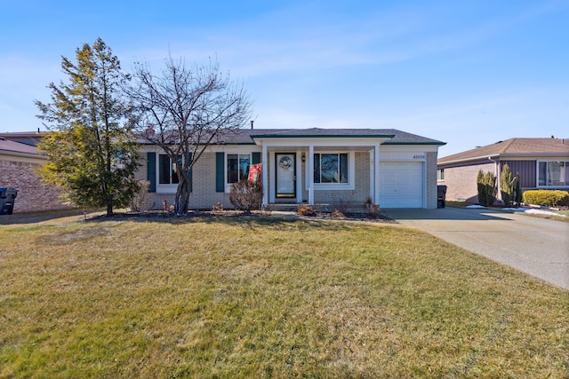 single story home with a garage, driveway, brick siding, and a front lawn