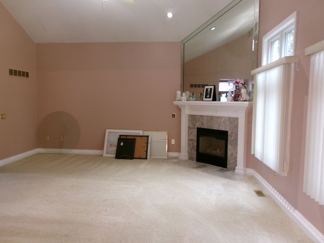 13267 Pearl Dr, Utica, MI 48315 - unfurnished living room with a tiled fireplace, a ceiling fan, visible vents, and carpet floors
