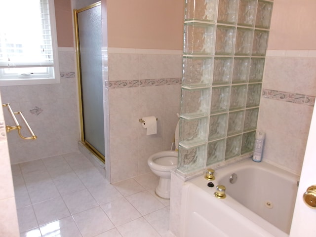 13267 Pearl Dr, Utica, MI 48315 - bathroom with a shower with door, tile patterned floors, and tile walls