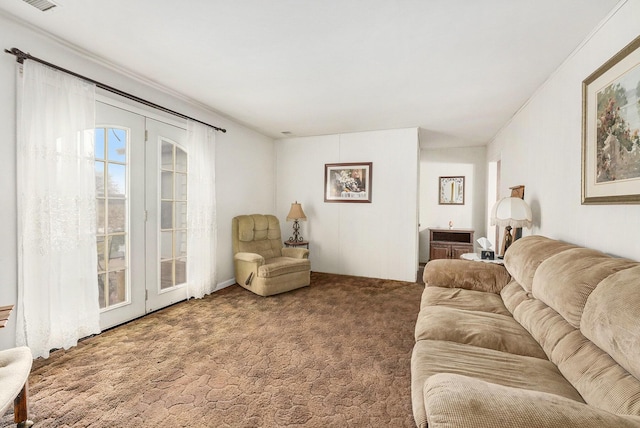 living room with carpet floors and visible vents