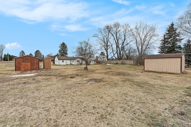 view of yard with a storage unit and an outdoor structure