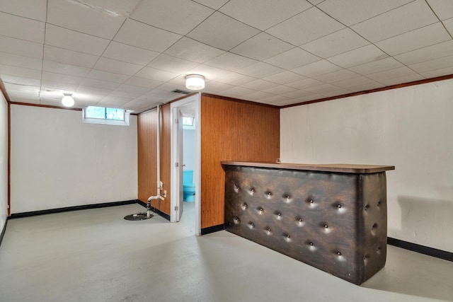 basement featuring visible vents and baseboards