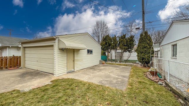 detached garage with fence