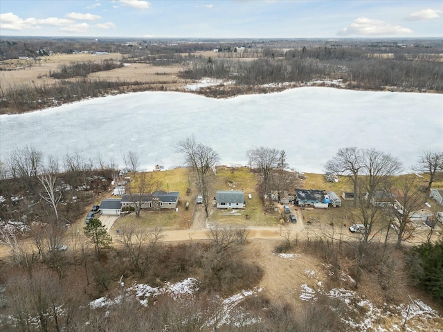 snowy aerial view featuring a rural view