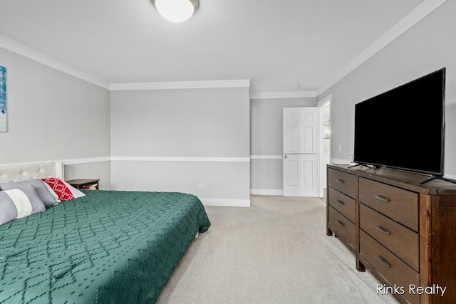 bedroom with light carpet, baseboards, and crown molding