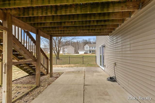 view of patio / terrace featuring fence