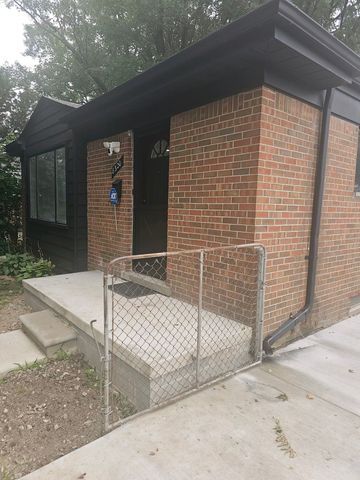 view of home's exterior featuring brick siding