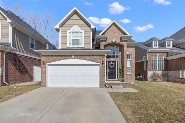 traditional-style home featuring brick siding, an attached garage, concrete driveway, and a front yard