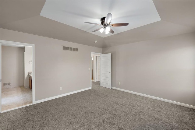 unfurnished bedroom with baseboards, visible vents, and carpet floors