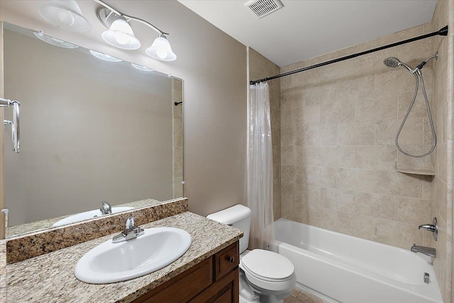 full bathroom featuring visible vents, toilet, vanity, and shower / bath combo