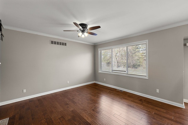 unfurnished room with visible vents, baseboards, and dark wood-style flooring