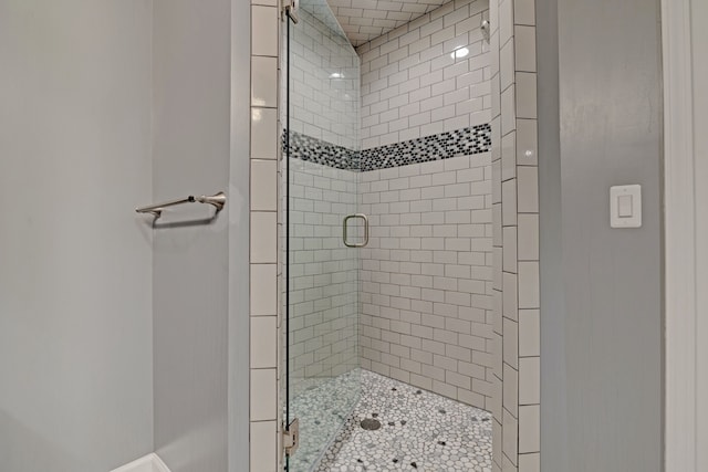 full bathroom with a stall shower